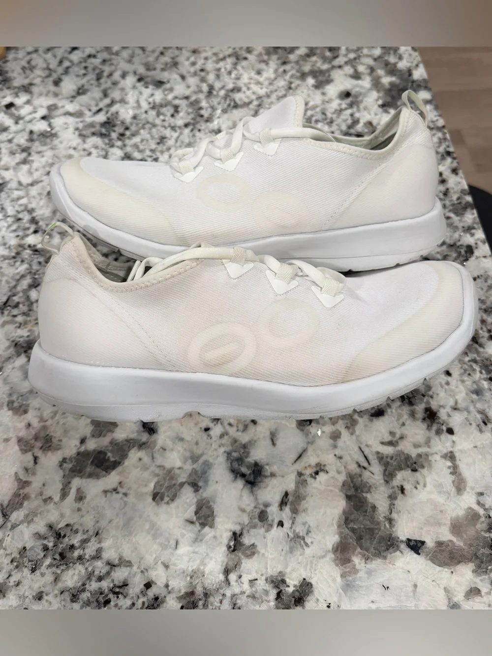 OOFOS Women's White Athletic Slip-On Sneakers with Green Insole Accent